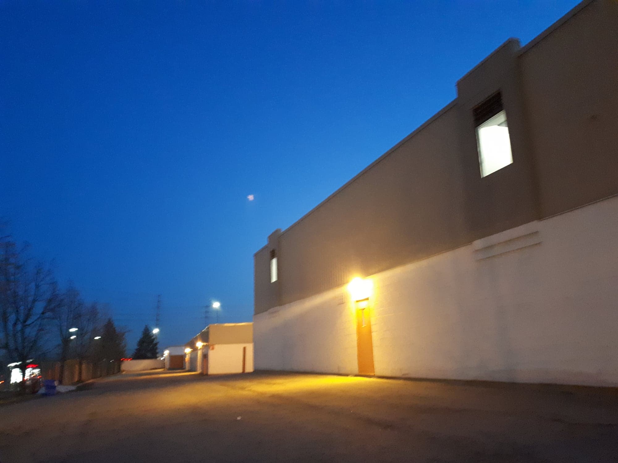 Renovated commercial facility exterior at dusk